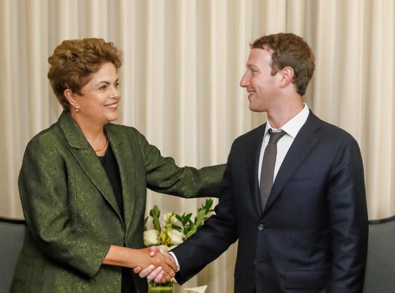 Mark Zuckerbrg looking at President Dilma Rousseff of Brazil.