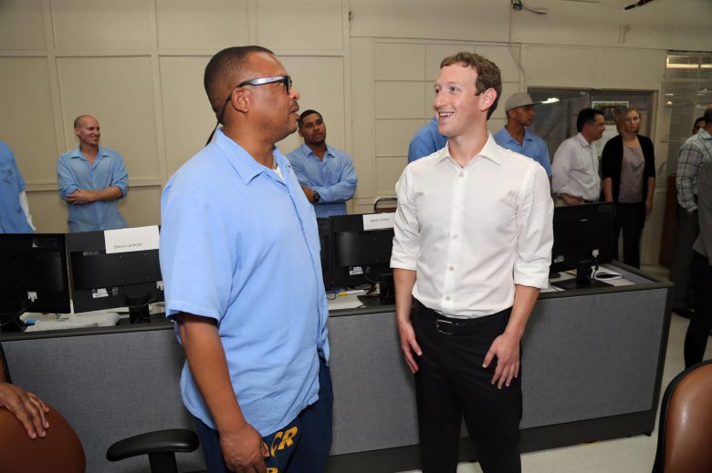Mark Zuckerberg looking at a prisoner in San Quentin, USA.