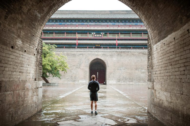 Mark Zuckerberg looking at an ancient wall in Xi'an, China.