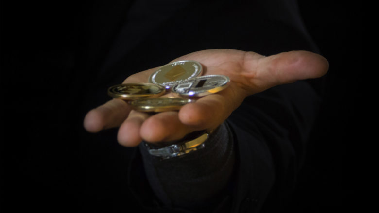 Krypto-Coins in der Hand. © Pixabay