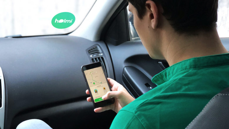 Die Holmi-App in der Hand eines Users. © Holmi