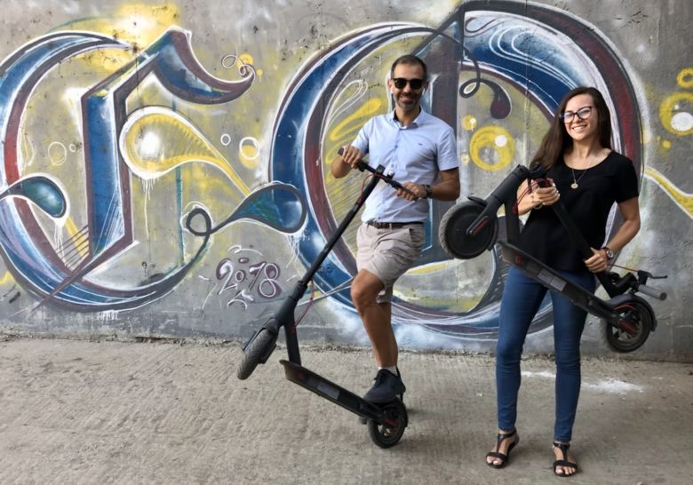 Stefan Grigorov and Rositsa Zhekova of Dreamix ride e-scooters.. because they're cool © Trending Topics
