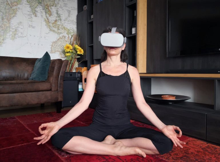 Stanimira Grigorova, CEO of iUVeda trying the new VR meditation experience developed by the company © iUVeda